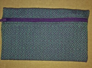 Zippered purple and tapestry blue bag